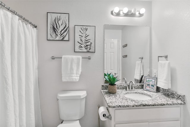 2814 Saddlebred Trl, Celina, TX 75009 - bathroom with toilet, vanity, and a shower with shower curtain