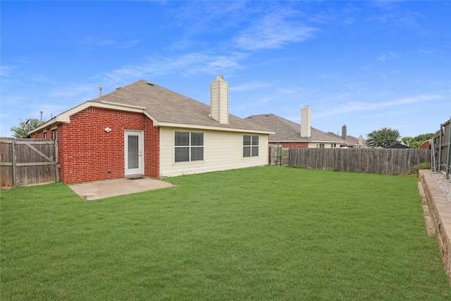 2814 Saddlebred Trl, Celina, TX 75009 - rear view of house featuring brick siding, a patio area, a chimney, and a shingled roof