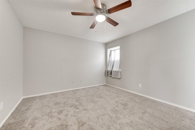 2537 Montclair Ln, Mesquite, TX 75150 - unfurnished room with carpet, a ceiling fan, a textured ceiling, and baseboards
