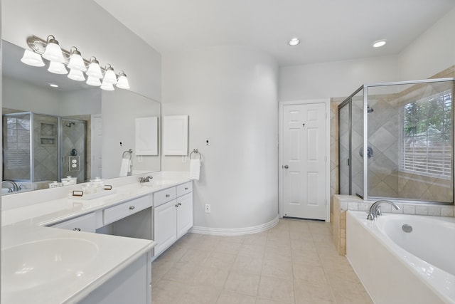14620 Windsor Ct, Addison, TX 75001 - full bath with double vanity, tile patterned floors, a shower stall, a garden tub, and baseboards