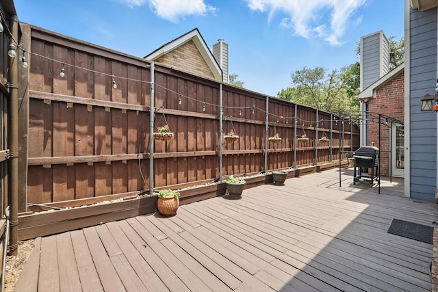 14620 Windsor Ct, Addison, TX 75001 - wooden deck featuring grilling area
