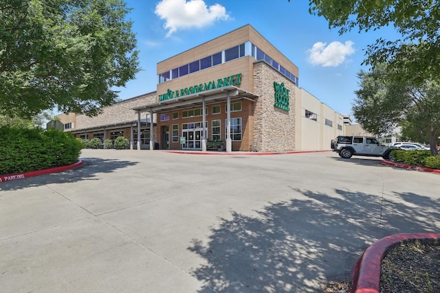 14620 Windsor Ct, Addison, TX 75001 - view of building exterior featuring uncovered parking