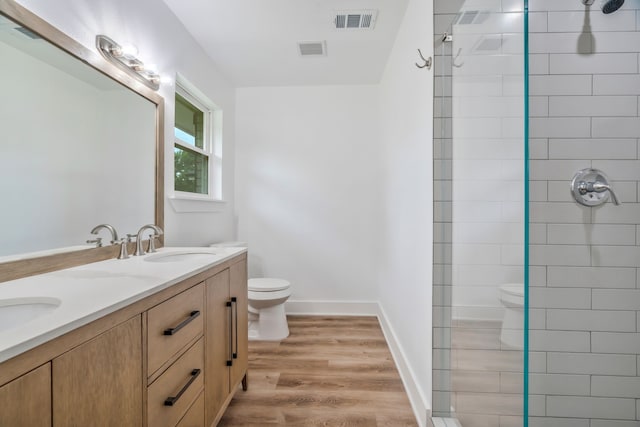 436 Crestwood Ter, Hurst, TX 76053 - full bathroom with toilet, double vanity, and a tile shower