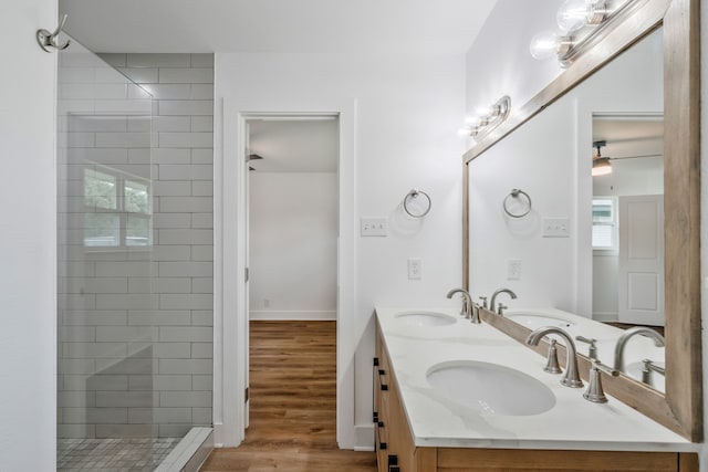 436 Crestwood Ter, Hurst, TX 76053 - full bath featuring double vanity, tiled shower, and wood finished floors