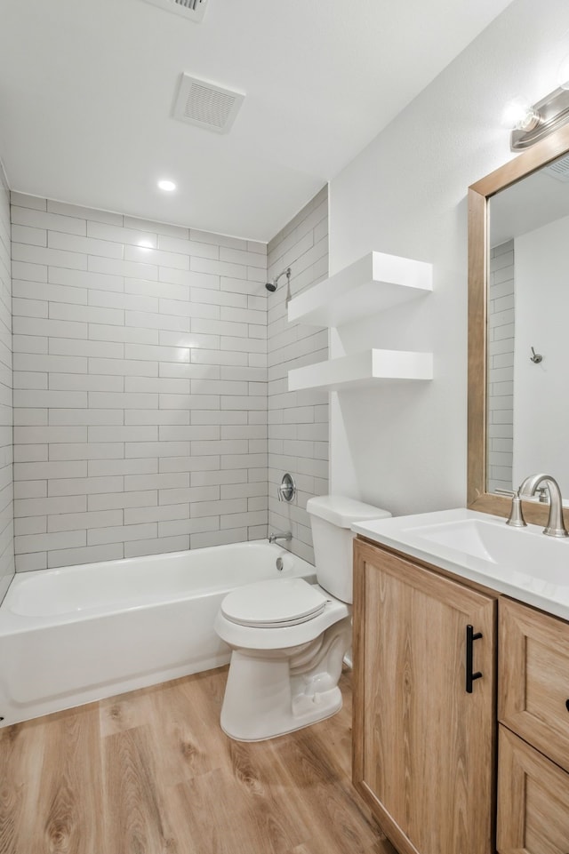 436 Crestwood Ter, Hurst, TX 76053 - full bathroom with wood finished floors, vanity, toilet, and shower / washtub combination