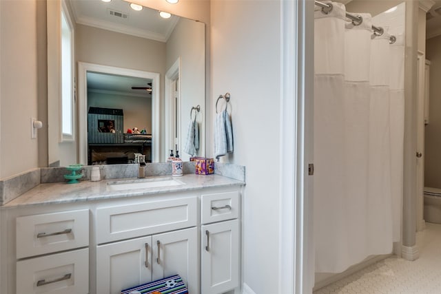 6242 Vickery Blvd, Dallas, TX 75214 - bathroom with ornamental molding, vanity, curtained shower, tile patterned floors, and a ceiling fan