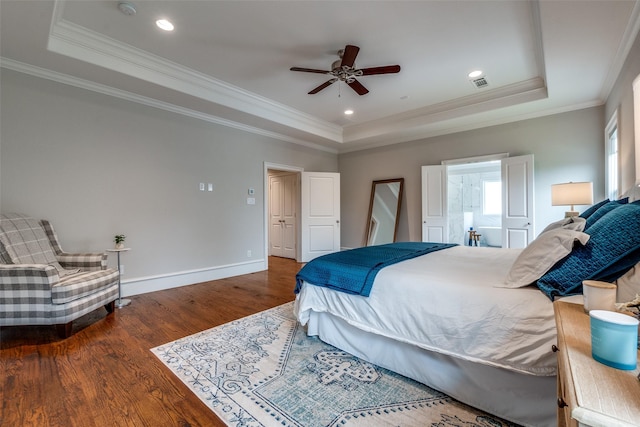 6242 Vickery Blvd, Dallas, TX 75214 - bedroom with a raised ceiling, wood finished floors, baseboards, crown molding, and ceiling fan