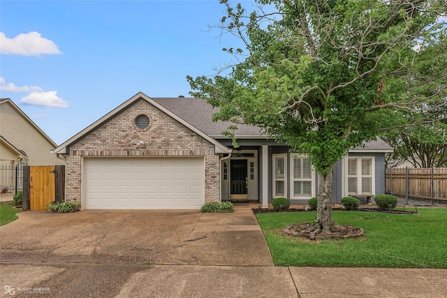 10085 Baldwin Ct, Shreveport, LA 71115 - view of front facade featuring concrete driveway, brick siding, an attached garage, and roof with shingles