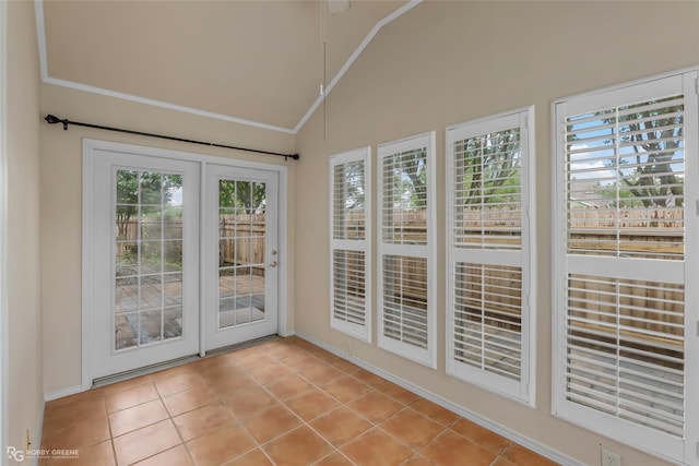 10085 Baldwin Ct, Shreveport, LA 71115 - unfurnished sunroom featuring tile patterned floors, lofted ceiling, and baseboards