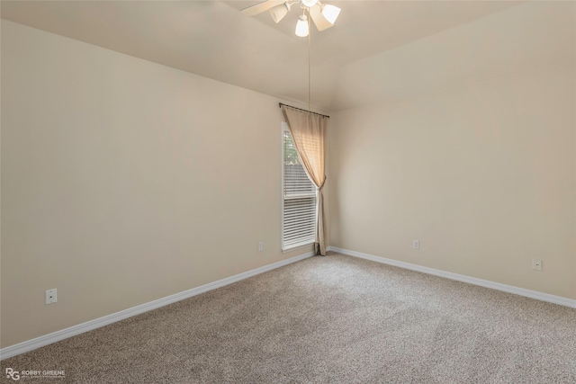 10085 Baldwin Ct, Shreveport, LA 71115 - empty room with light carpet, a ceiling fan, baseboards, and lofted ceiling