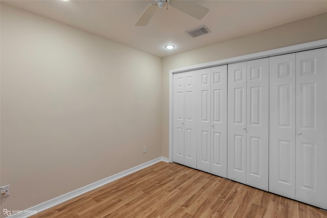10085 Baldwin Ct, Shreveport, LA 71115 - unfurnished bedroom featuring light wood-style floors, baseboards, ceiling fan, a closet, and recessed lighting