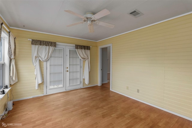 10085 Baldwin Ct, Shreveport, LA 71115 - empty room with light wood-type flooring, a ceiling fan, baseboards, and crown molding