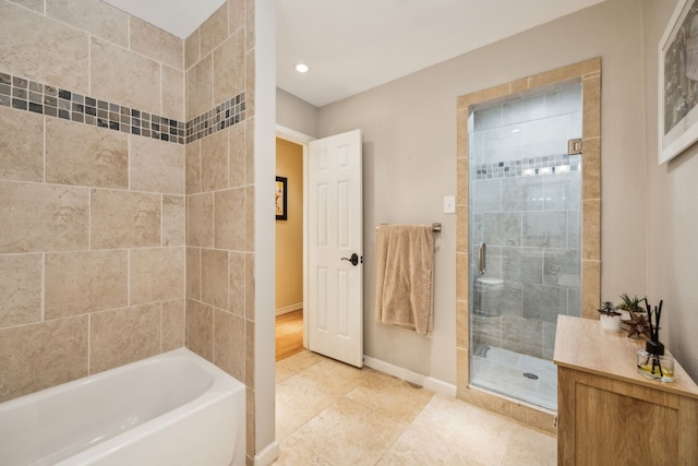 9834 Carnegie Dr, Dallas, TX 75228 - full bath featuring a tile shower, a bath, recessed lighting, baseboards, and tile patterned floors