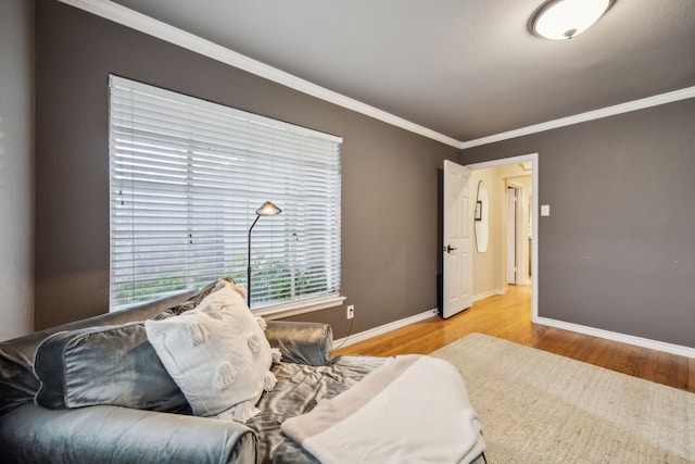 9834 Carnegie Dr, Dallas, TX 75228 - bedroom with baseboards, wood finished floors, and ornamental molding