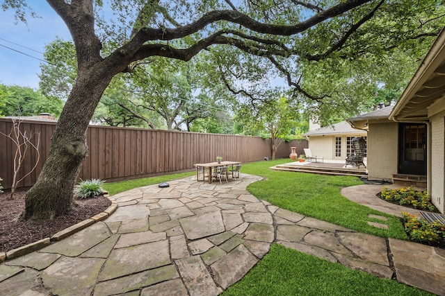 9834 Carnegie Dr, Dallas, TX 75228 - view of yard with a patio area, outdoor dining space, and a wooden deck