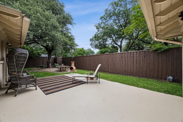 9834 Carnegie Dr, Dallas, TX 75228 - fenced backyard with a patio area