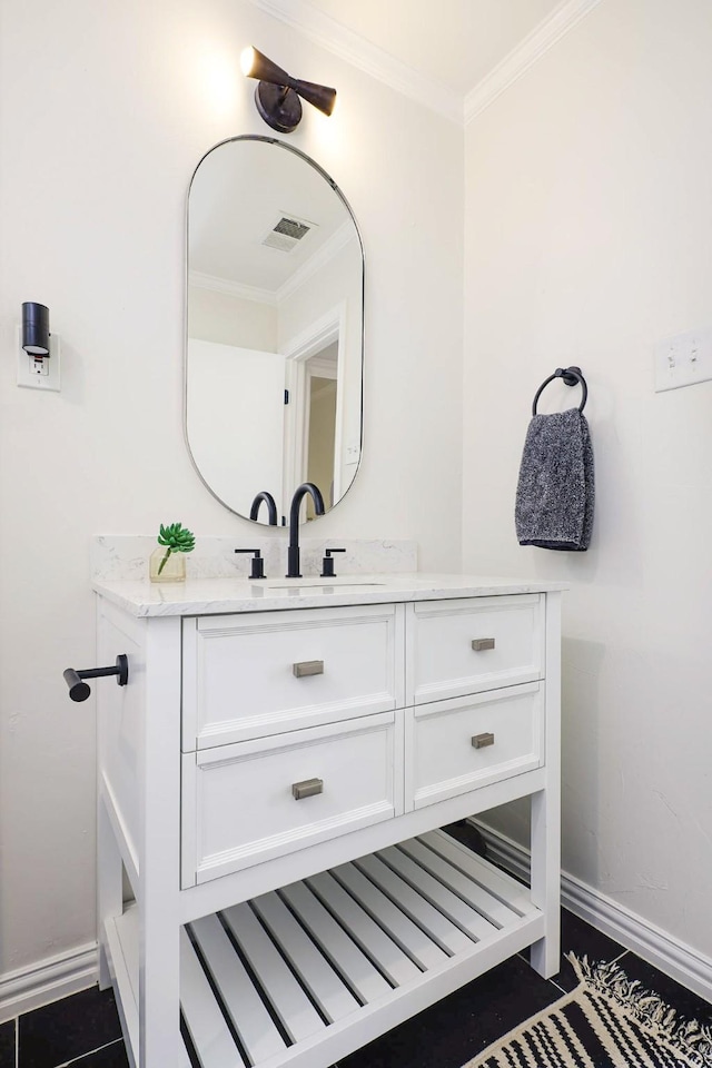 4040 Morman Ln, Addison, TX 75001 - bathroom featuring vanity, baseboards, and ornamental molding