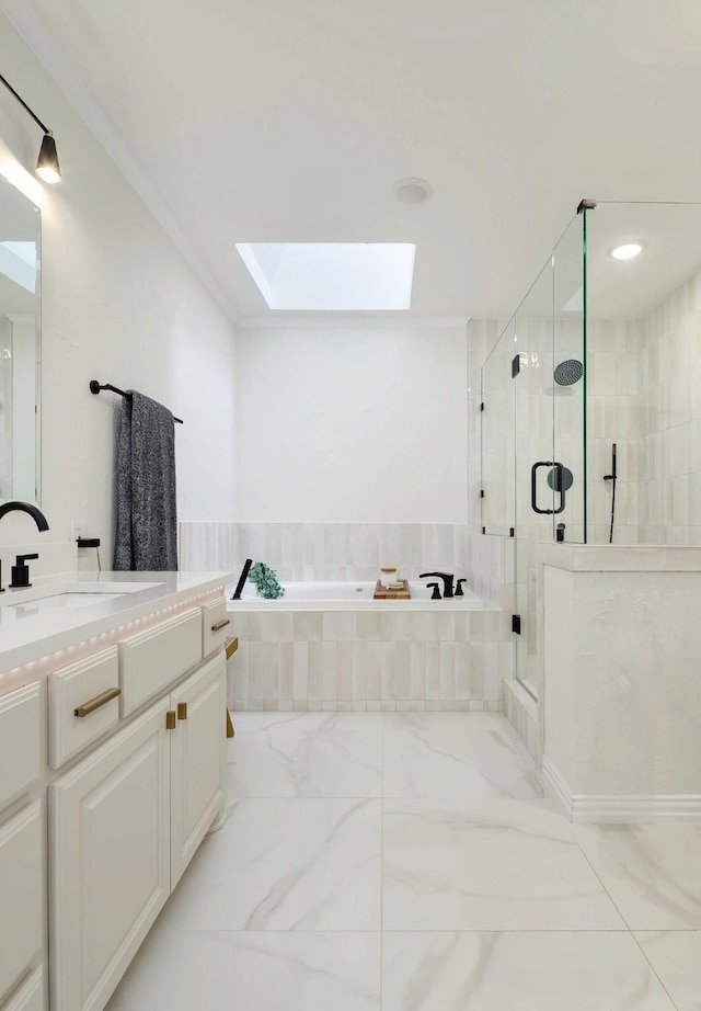 4040 Morman Ln, Addison, TX 75001 - bathroom with a skylight, vanity, a garden tub, a stall shower, and marble look tiles