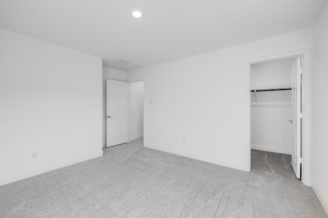 1204 Toro Trl, Fort Worth, TX 76052 - unfurnished bedroom with carpet flooring, a walk in closet, baseboards, a closet, and recessed lighting