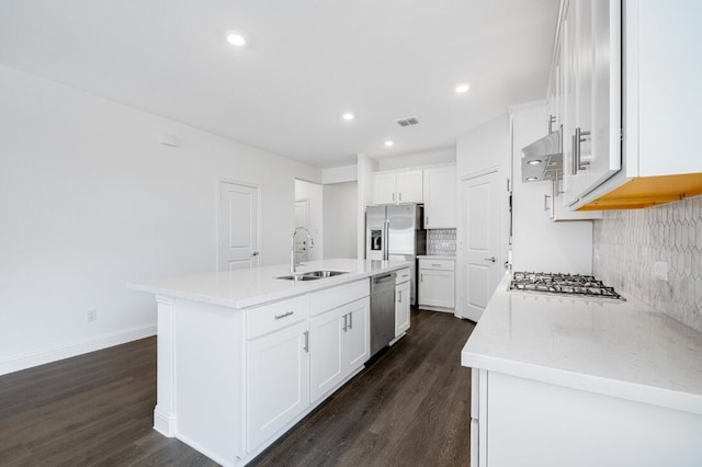 1204 Toro Trl, Fort Worth, TX 76052 - kitchen featuring a sink, stainless steel appliances, range hood, decorative backsplash, and dark wood-style floors