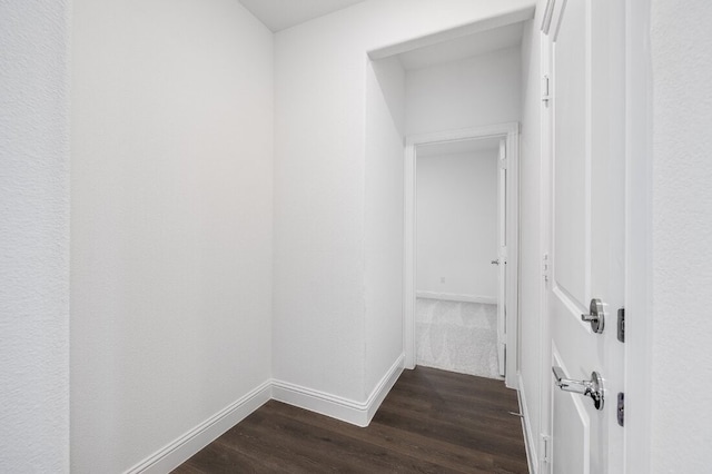 1204 Toro Trl, Fort Worth, TX 76052 - hall featuring dark wood-style floors and baseboards