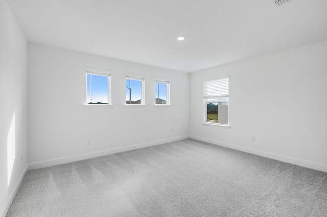 1204 Toro Trl, Fort Worth, TX 76052 - unfurnished room with carpet, baseboards, and recessed lighting