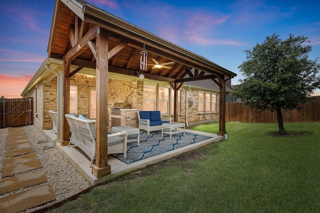 2837 Redbud Ln, Melissa, TX 75454 - yard at dusk with ceiling fan, a patio, and an outdoor hangout area