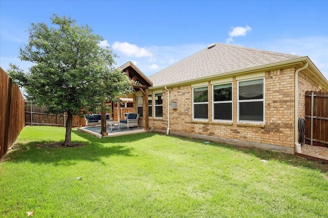 2837 Redbud Ln, Melissa, TX 75454 - back of property featuring brick siding, roof with shingles, a patio area, and outdoor lounge area