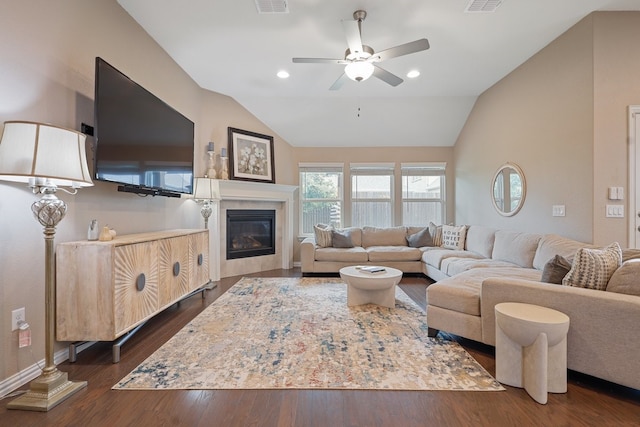 2837 Redbud Ln, Melissa, TX 75454 - living room featuring lofted ceiling, a ceiling fan, dark wood finished floors, a tile fireplace, and baseboards