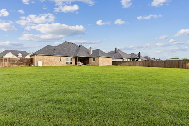 8900 Hidden Pond St, Justin, TX 76247 - rear view of property featuring brick siding