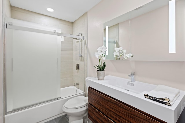 10528 Swallow Ln, Dallas, TX 75218 - full bathroom featuring vanity, toilet, and enclosed tub / shower combo
