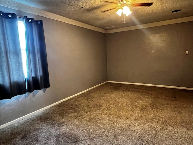 106 Lane St, Comanche, TX 76442 - carpeted spare room featuring a textured ceiling, a ceiling fan, and baseboards