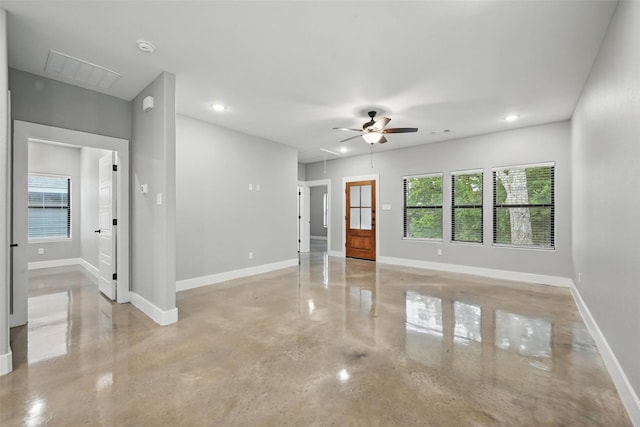 713 E Texas St, Denison, TX 75021 - unfurnished room featuring attic access, concrete floors, baseboards, ceiling fan, and recessed lighting