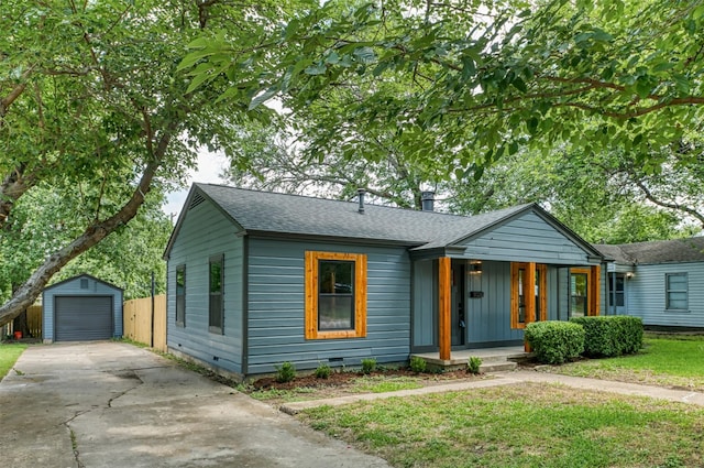 7333 Pensacola Ave, Fort Worth, TX 76116 - bungalow-style home featuring a porch, an outdoor structure, concrete driveway, a detached garage, and roof with shingles
