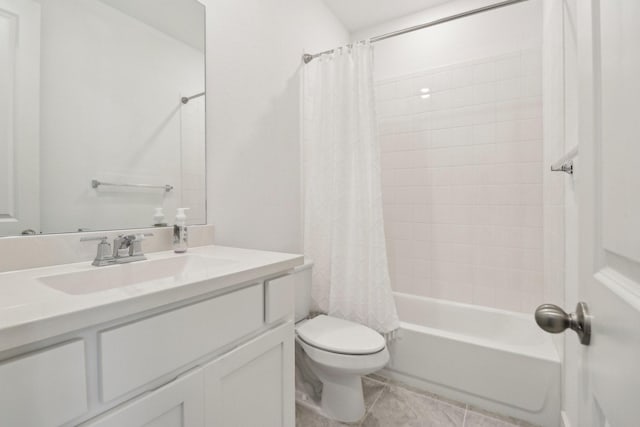 2208 13th St, Argyle, TX 76226 - full bath with toilet, vanity, shower / tub combo with curtain, and tile patterned flooring