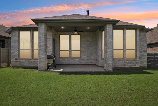 2208 13th St, Argyle, TX 76226 - rear view of house featuring ceiling fan, a patio area, a shingled roof, and brick siding