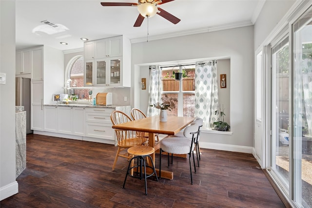 2201 Heatherton Pl, Plano, TX 75023 - dining room featuring ornamental molding, a ceiling fan, baseboards, dark wood-style flooring, and recessed lighting