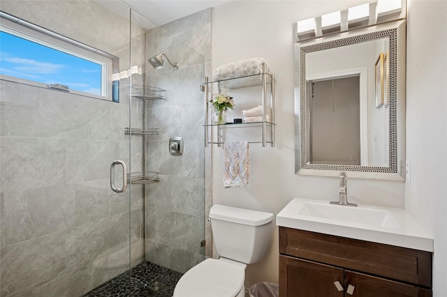 2201 Heatherton Pl, Plano, TX 75023 - full bathroom with vanity, a shower stall, and toilet