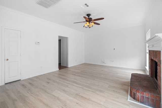 12809 Conifer Ln, Fort Worth, TX 76040 - unfurnished living room featuring a brick fireplace, a ceiling fan, ornamental molding, light wood-style floors, and baseboards