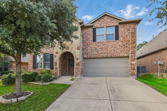 7009 Bishop Pine Rd, Denton, TX 76208 - view of front of property with a garage, central air condition unit, driveway, a front lawn, and brick siding