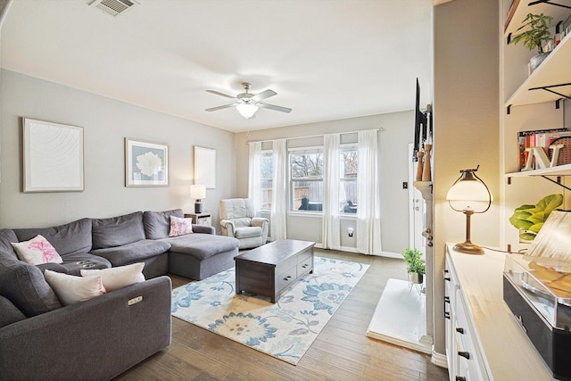 7009 Bishop Pine Rd, Denton, TX 76208 - living area featuring ceiling fan and wood finished floors
