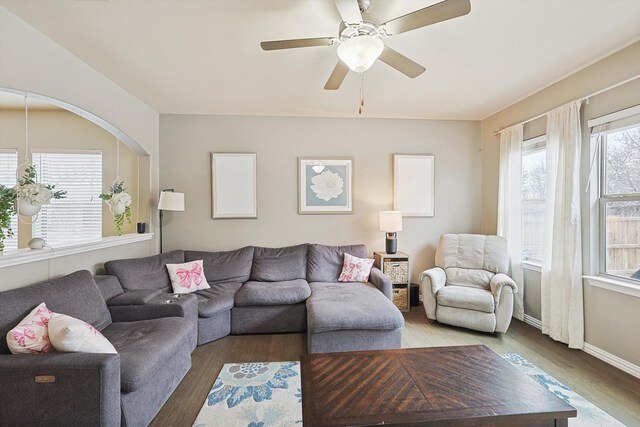 7009 Bishop Pine Rd, Denton, TX 76208 - living room with wood finished floors, a ceiling fan, and baseboards