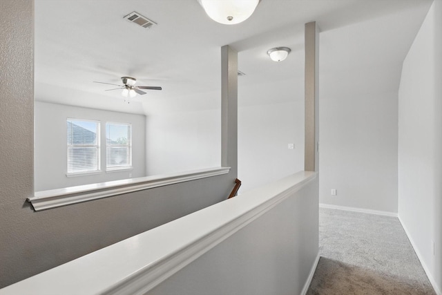 7009 Bishop Pine Rd, Denton, TX 76208 - hallway with carpet flooring, an upstairs landing, and baseboards