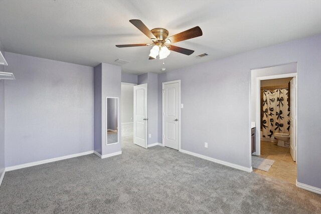 7009 Bishop Pine Rd, Denton, TX 76208 - unfurnished bedroom featuring carpet, baseboards, ensuite bathroom, and ceiling fan