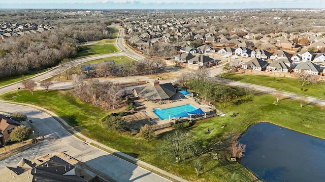7009 Bishop Pine Rd, Denton, TX 76208 - aerial view of property and surrounding area featuring a pool, nearby suburban area, and a large body of water