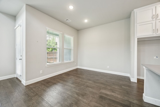 2070 White Grove Dr, Dallas, TX 75228 - unfurnished dining area featuring dark wood finished floors, recessed lighting, and baseboards