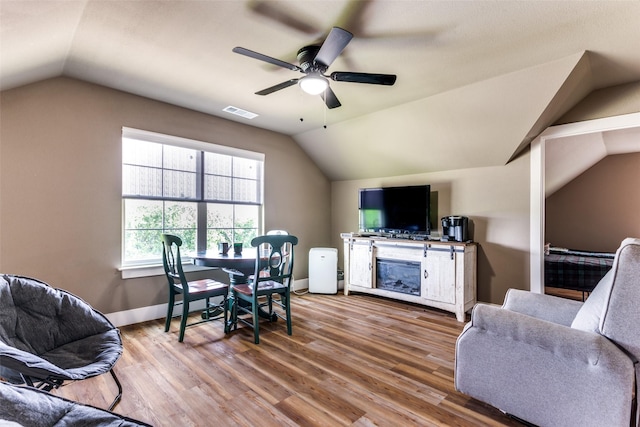 4620 County Road 707, Cleburne, TX 76031 - dining area with lofted ceiling, a ceiling fan, wood finished floors, and baseboards