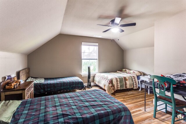 4620 County Road 707, Cleburne, TX 76031 - bedroom with wood finished floors, vaulted ceiling, and ceiling fan
