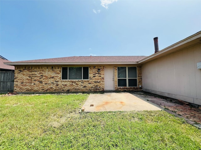 1013 Gannon Dr, Plano, TX 75025 - property entrance featuring brick siding, a patio, and a lawn
