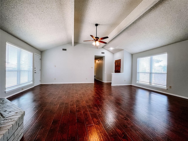 1013 Gannon Dr, Plano, TX 75025 - unfurnished living room featuring a ceiling fan, a textured ceiling, wood finished floors, healthy amount of natural light, and baseboards